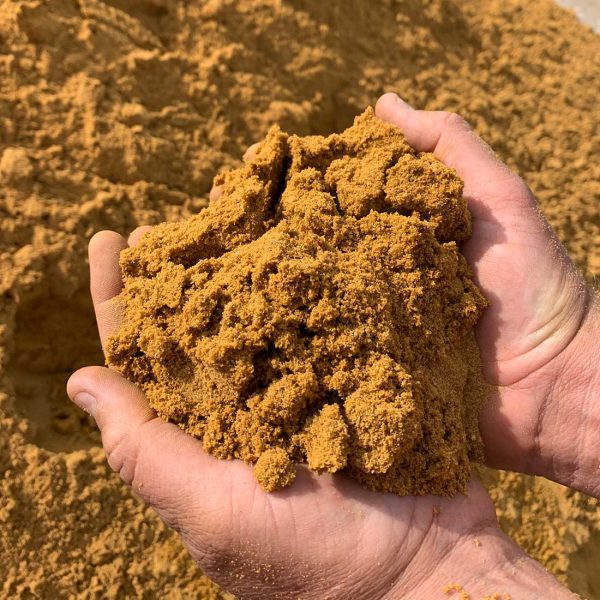 Handful of building sand