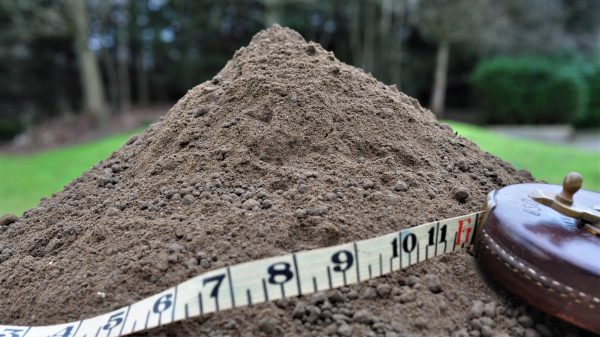 sandy loam with measuring tape