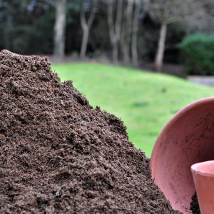 Topsoil next to plant pots